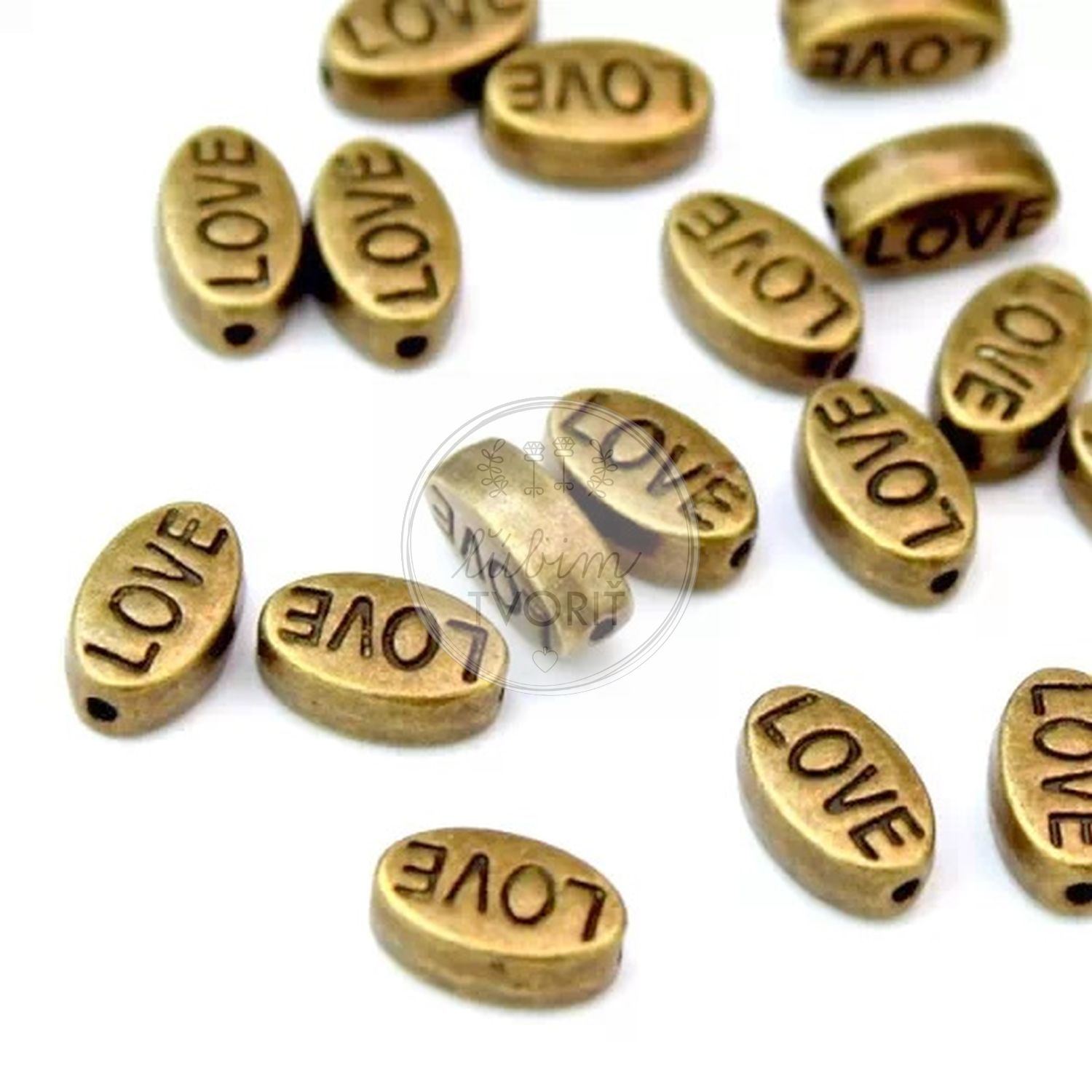 Kovová korálka LOVE, 10 x 6 mm - 1 ks